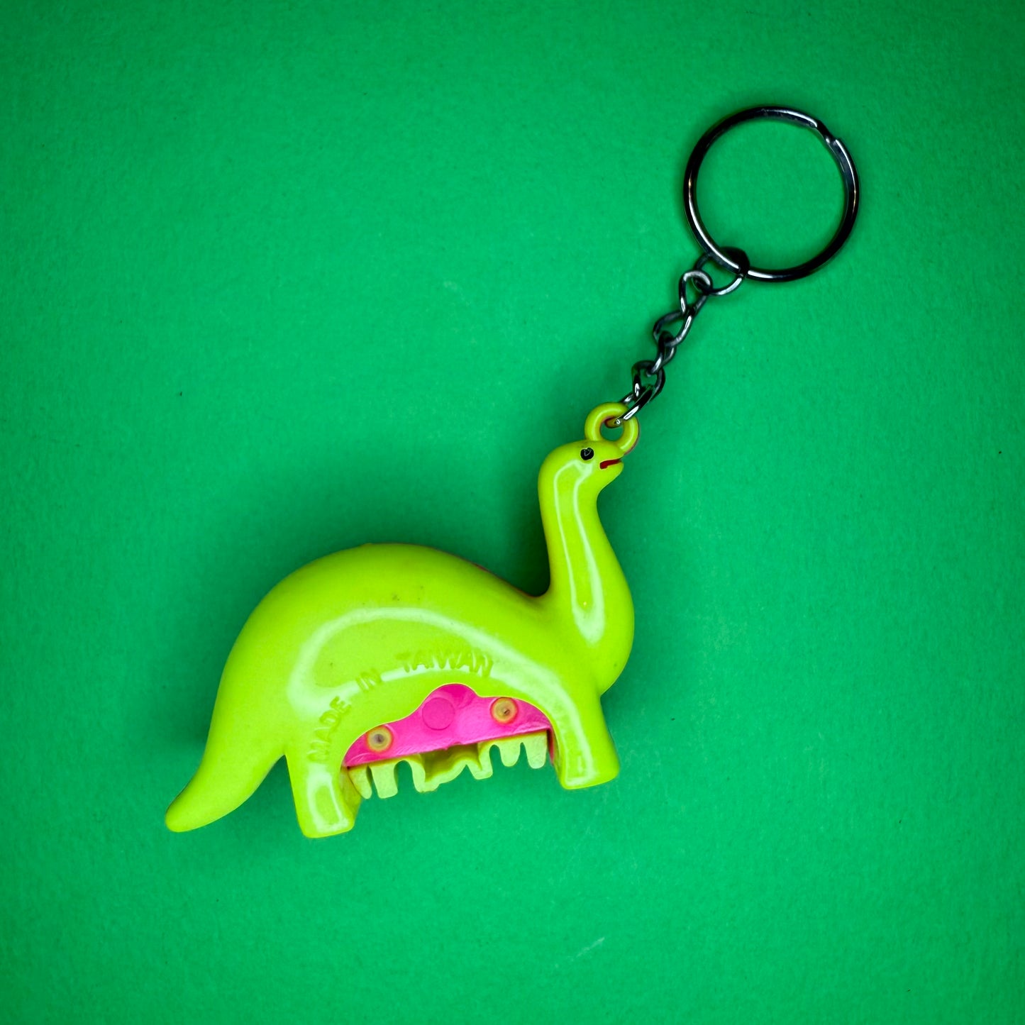 Retro plastic mummy dinorsaue neon keyring