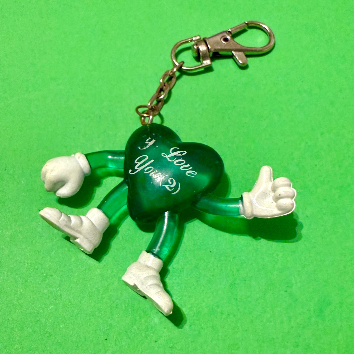 Retro plastic 80s green heart man keyring