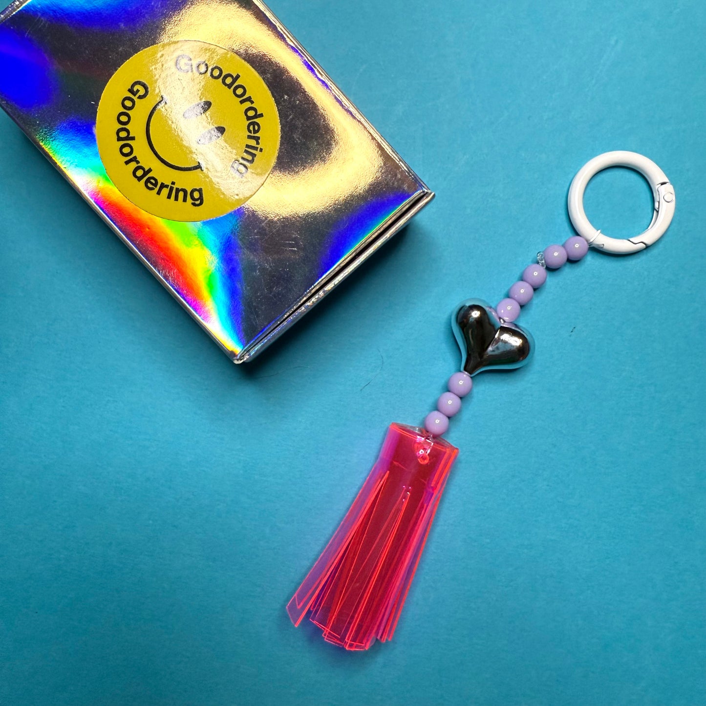 Neon and beaded heart tassle charm