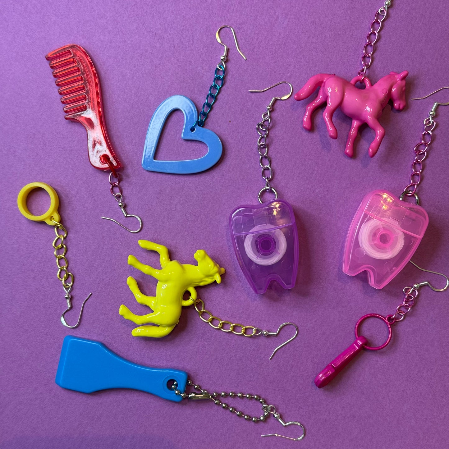 Toy’n’teeth drop chain earrings