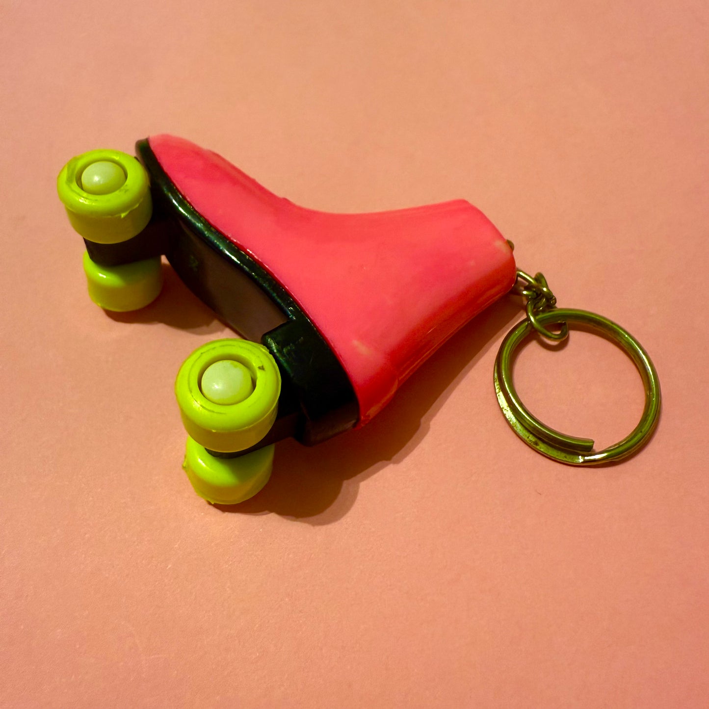 Neon 80s mini pink roller skate charm keyring