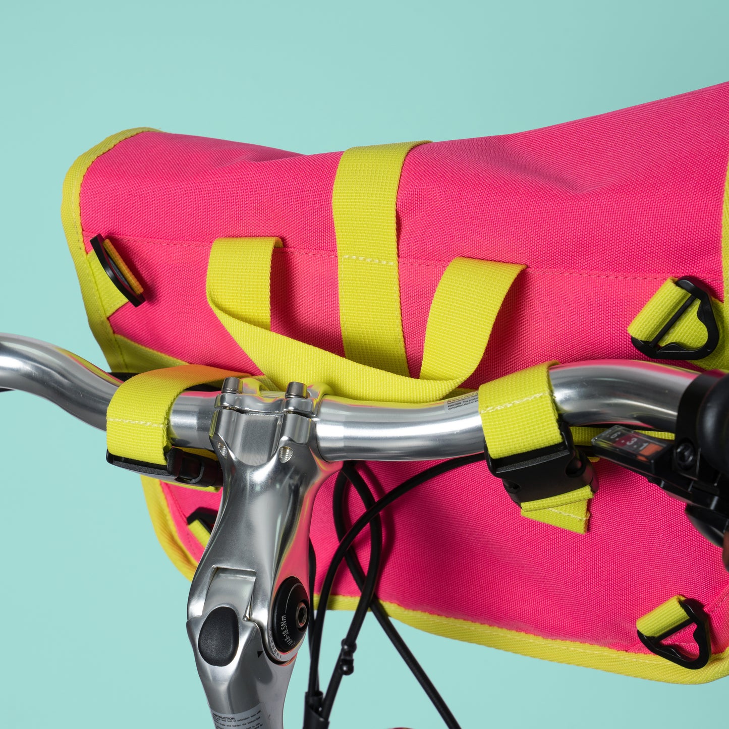 Neon pink and yellow roll top handlebar bag shoulder bag