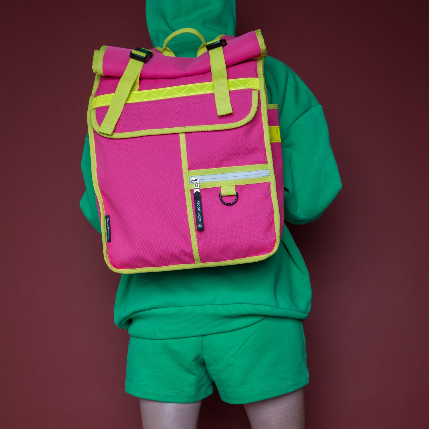 Neon pink rolltop backpack pannier bike bag