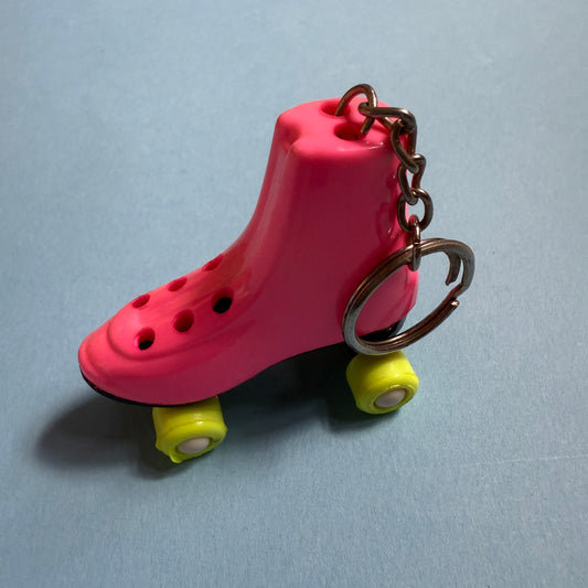 Neon 80s mini pink roller skate charm keyring