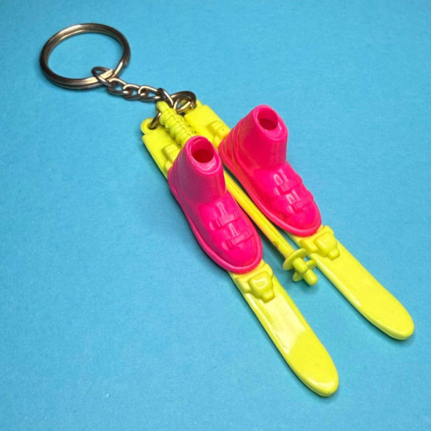 Neon 80s mini ski and poles charm keyring