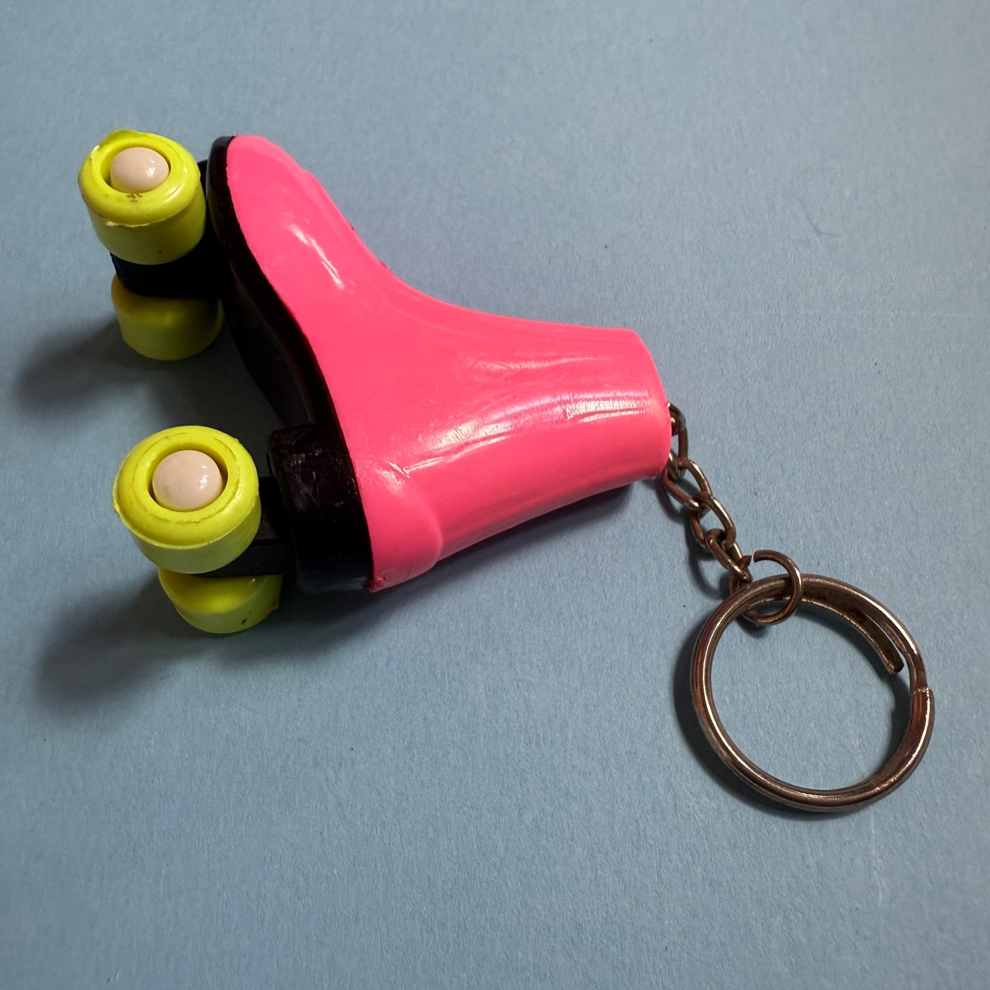 Neon 80s mini pink roller skate charm keyring