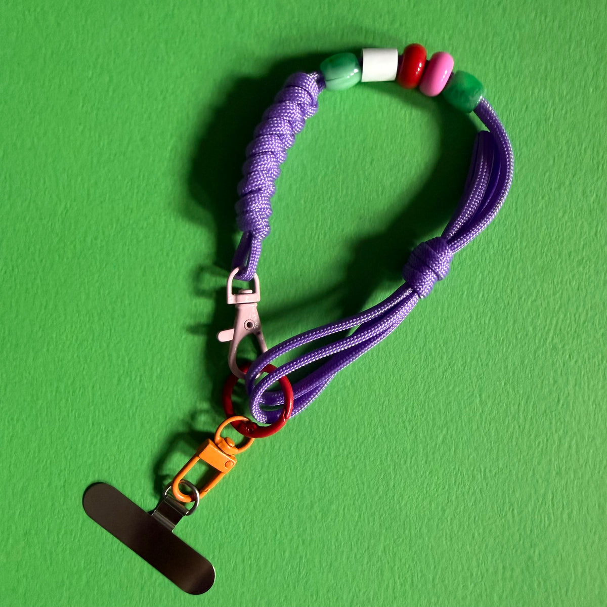 Phone wrist strap with fidget beads