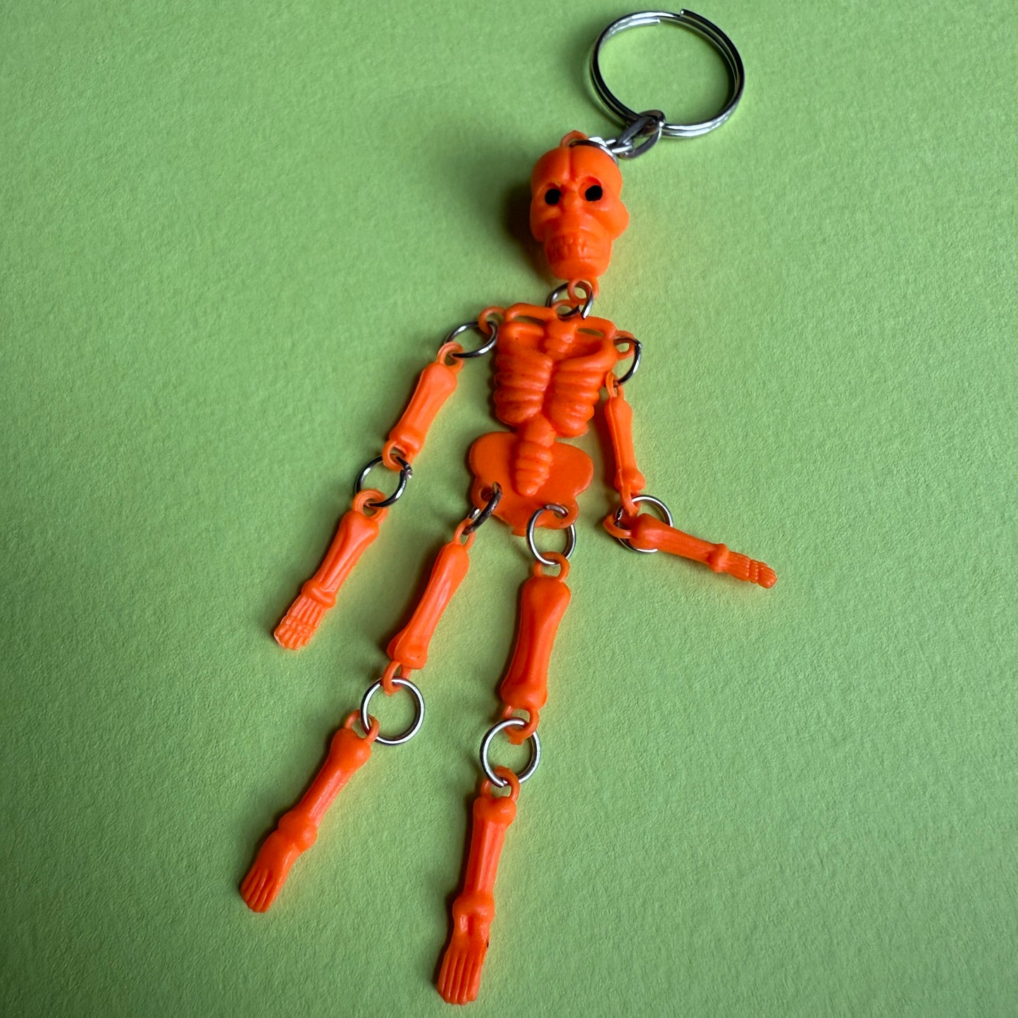 Neon 80s skeleton charm