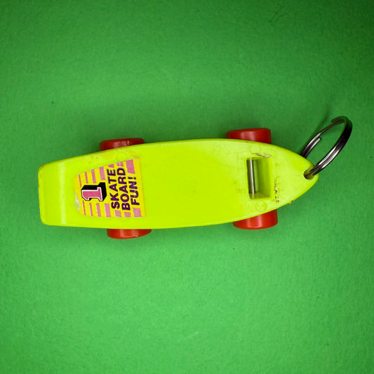 Retro plastic skateboard yellow neon keyring