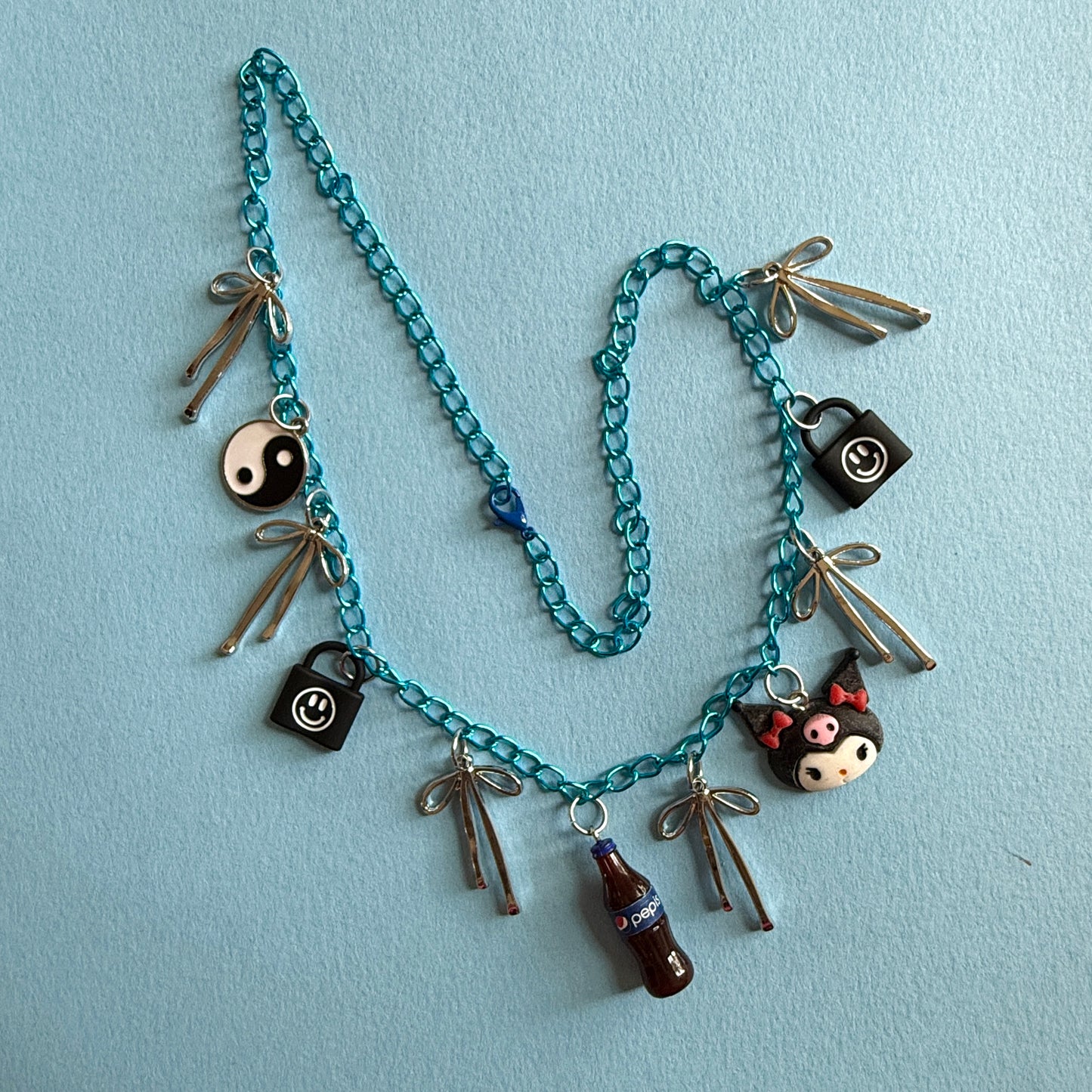 Emo bue charm necklace