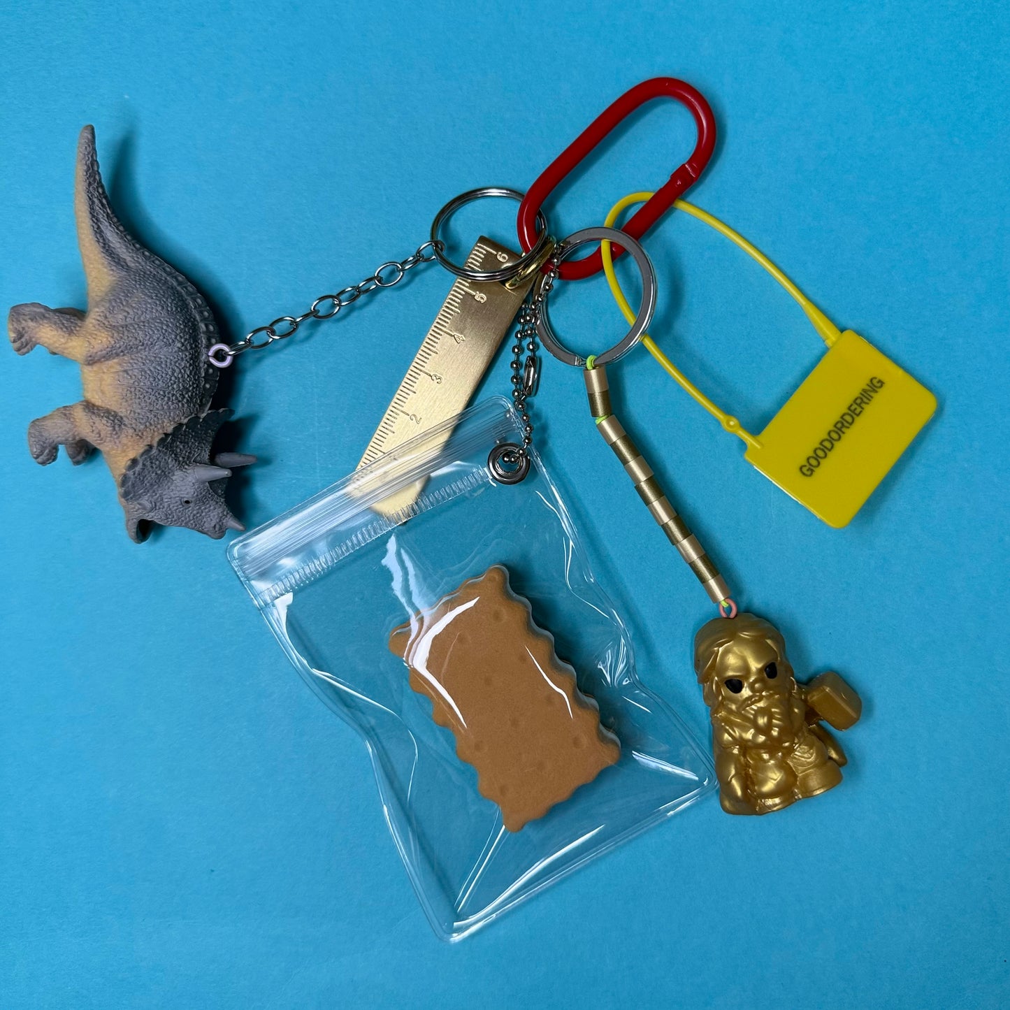 Bag charm and keyring gold ruler dinosaur