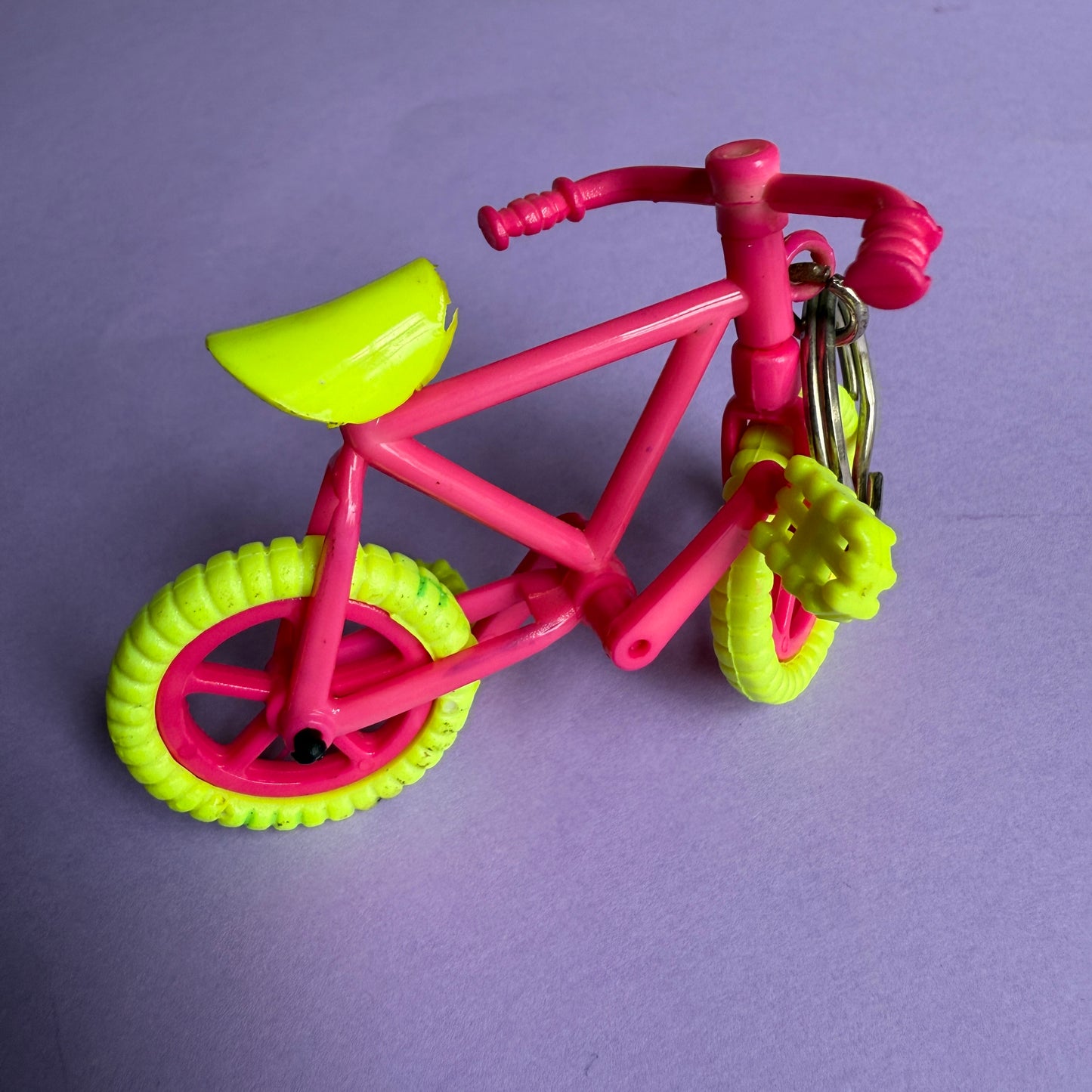 Neon 80s pink bicycle charm