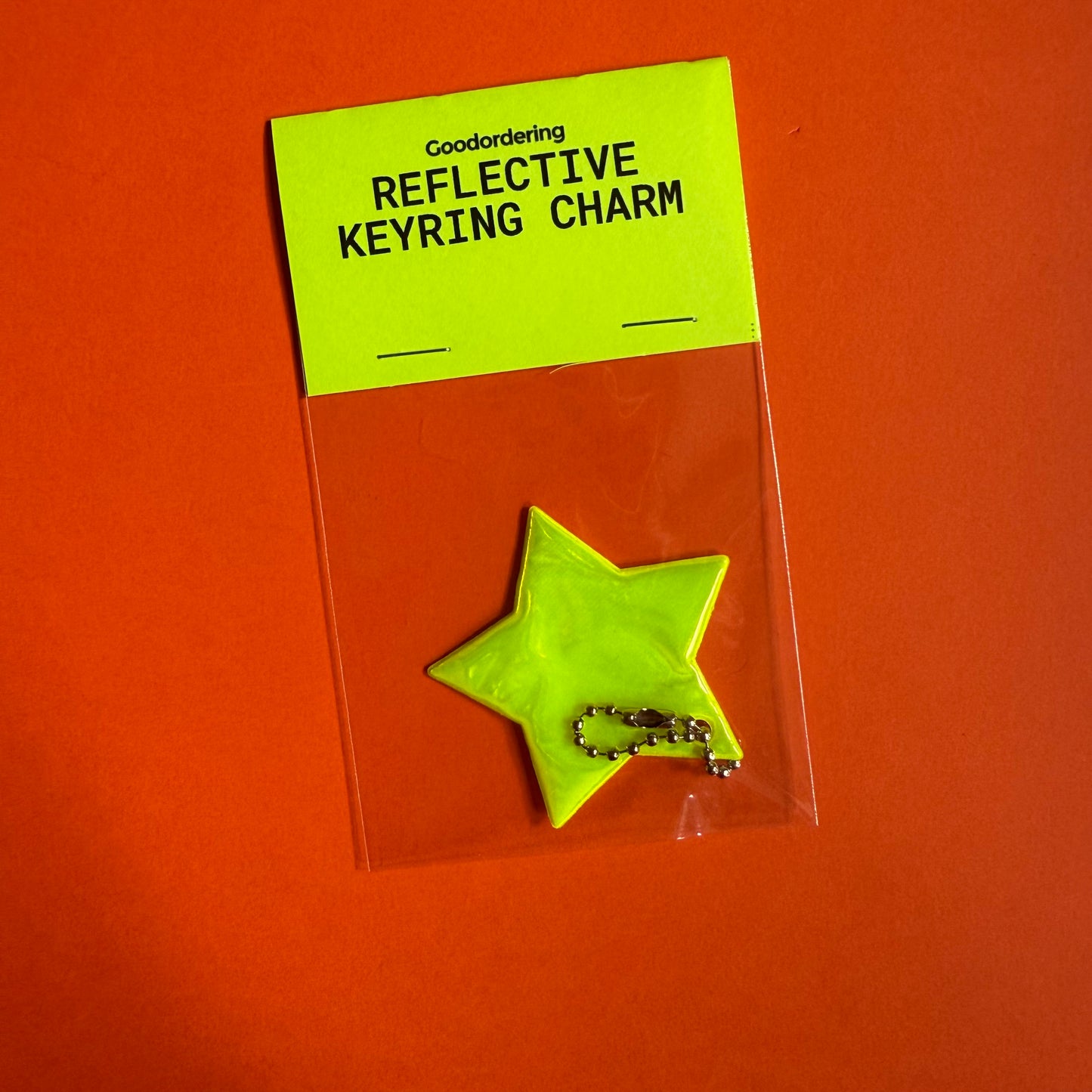 Neon star light reflector charm
