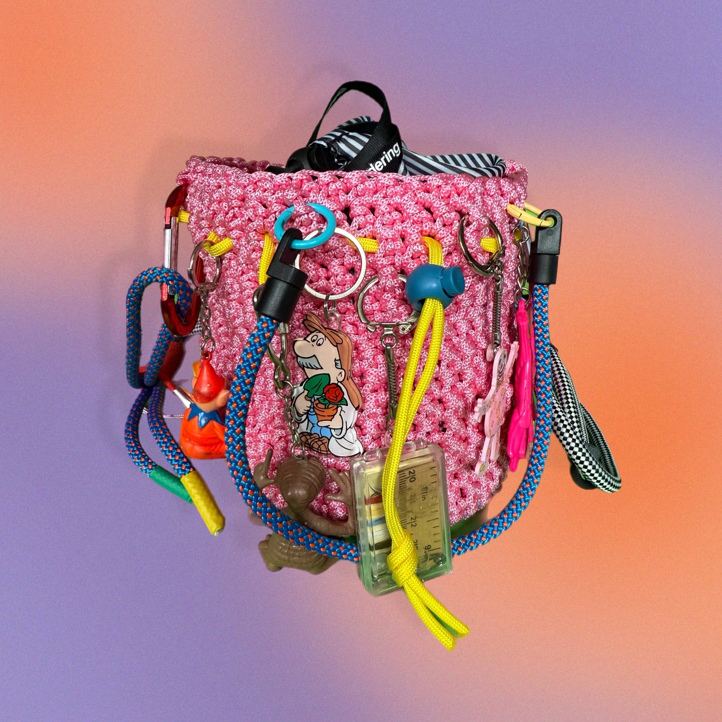 Crocheted paracord bucket bag with charms
