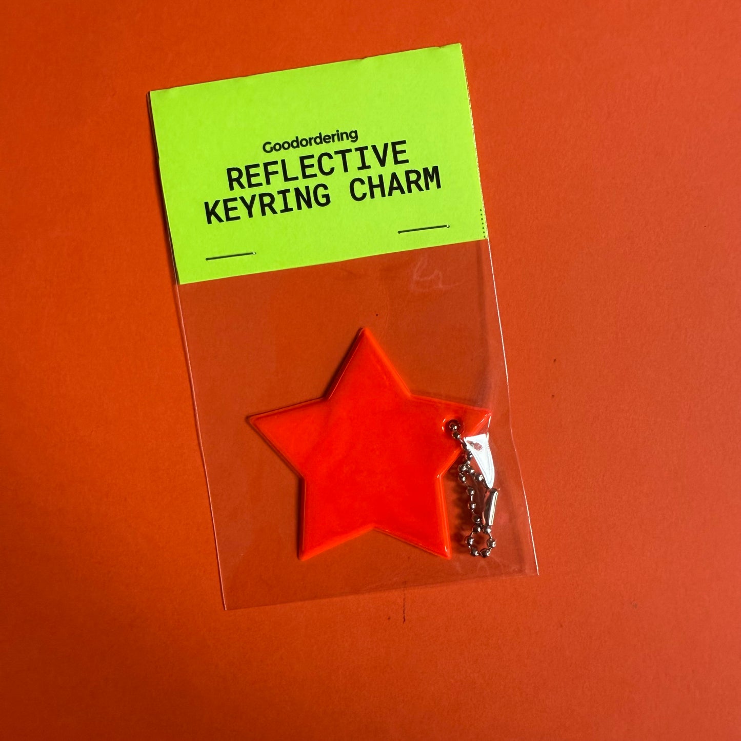 Neon star light reflector charm