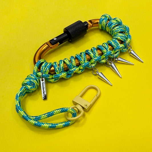 Paracord wrapped carabiner green spikes
