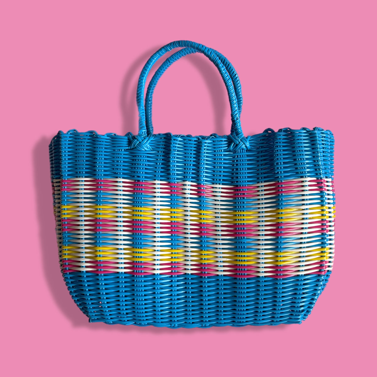 Blue bike pannier basket attached to bicycle