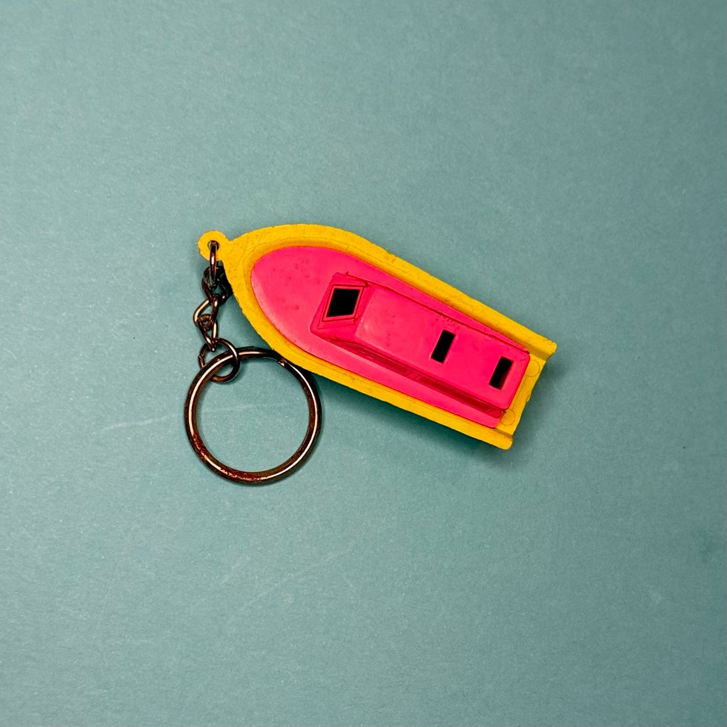 Neon 80s mini speed boat charm keyring