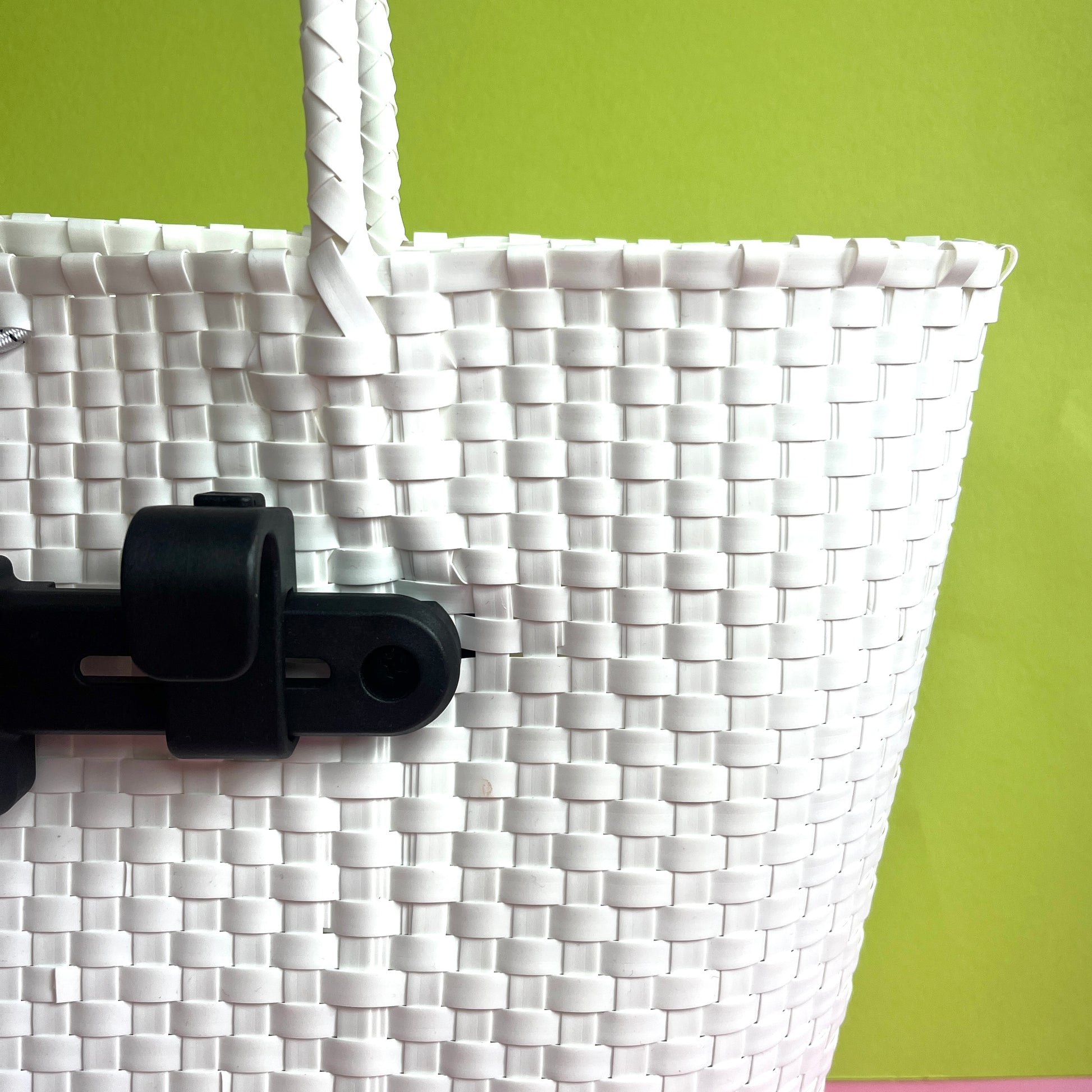 white plastic woven basket with pannier hooks and elastic toggle closure Goodordering cycling basket