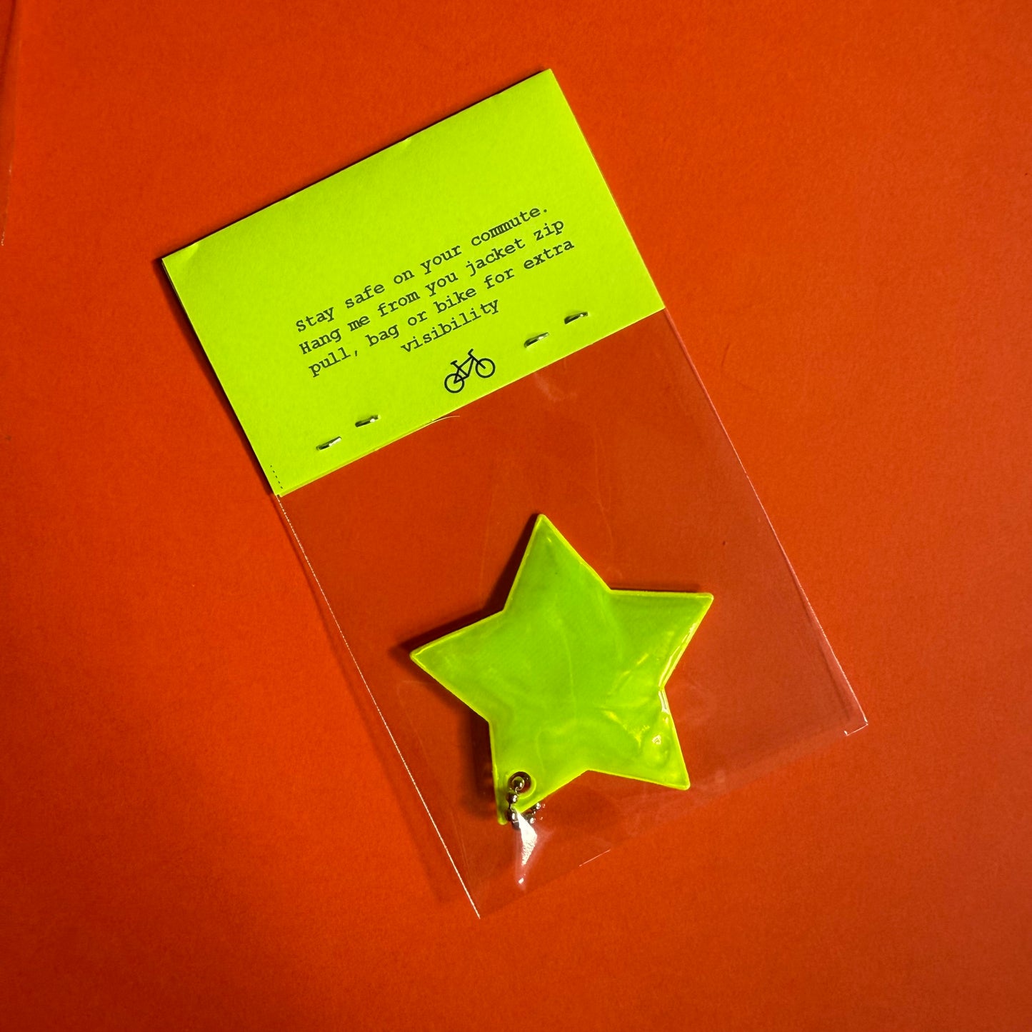 Neon star light reflector charm