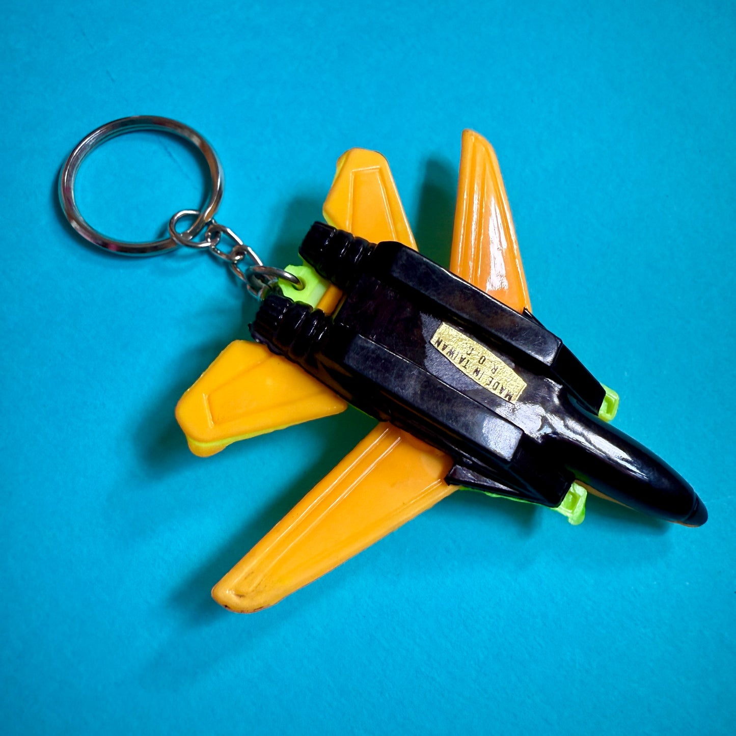 Neon 80s vintage jet plane charm