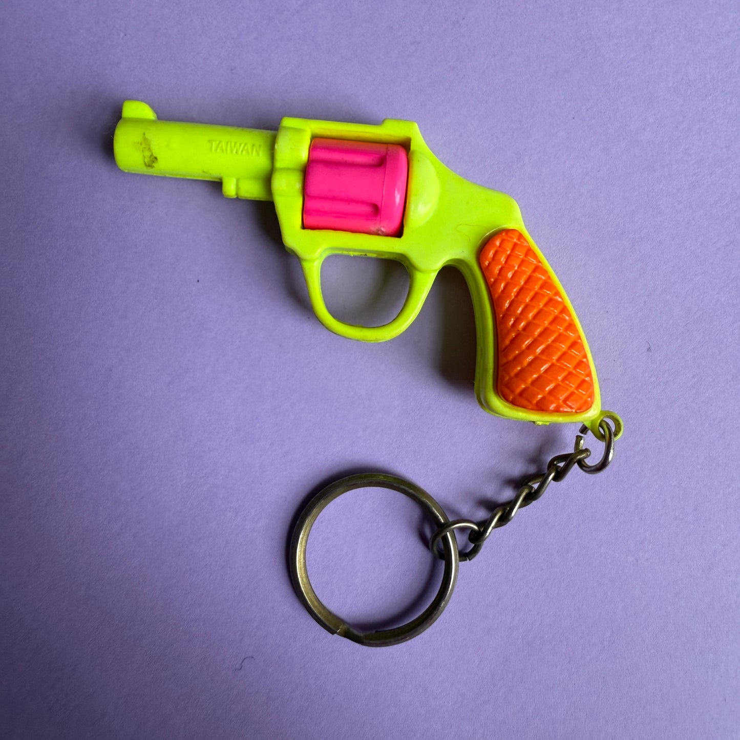 Neon 80s plastic gun charm