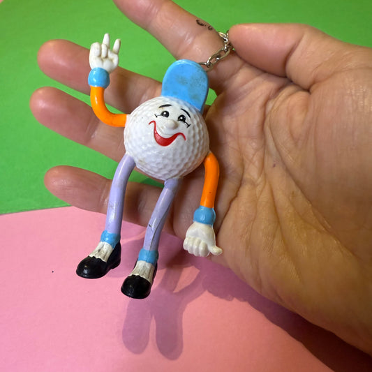 Retro plastic 80s golf ball man keyring