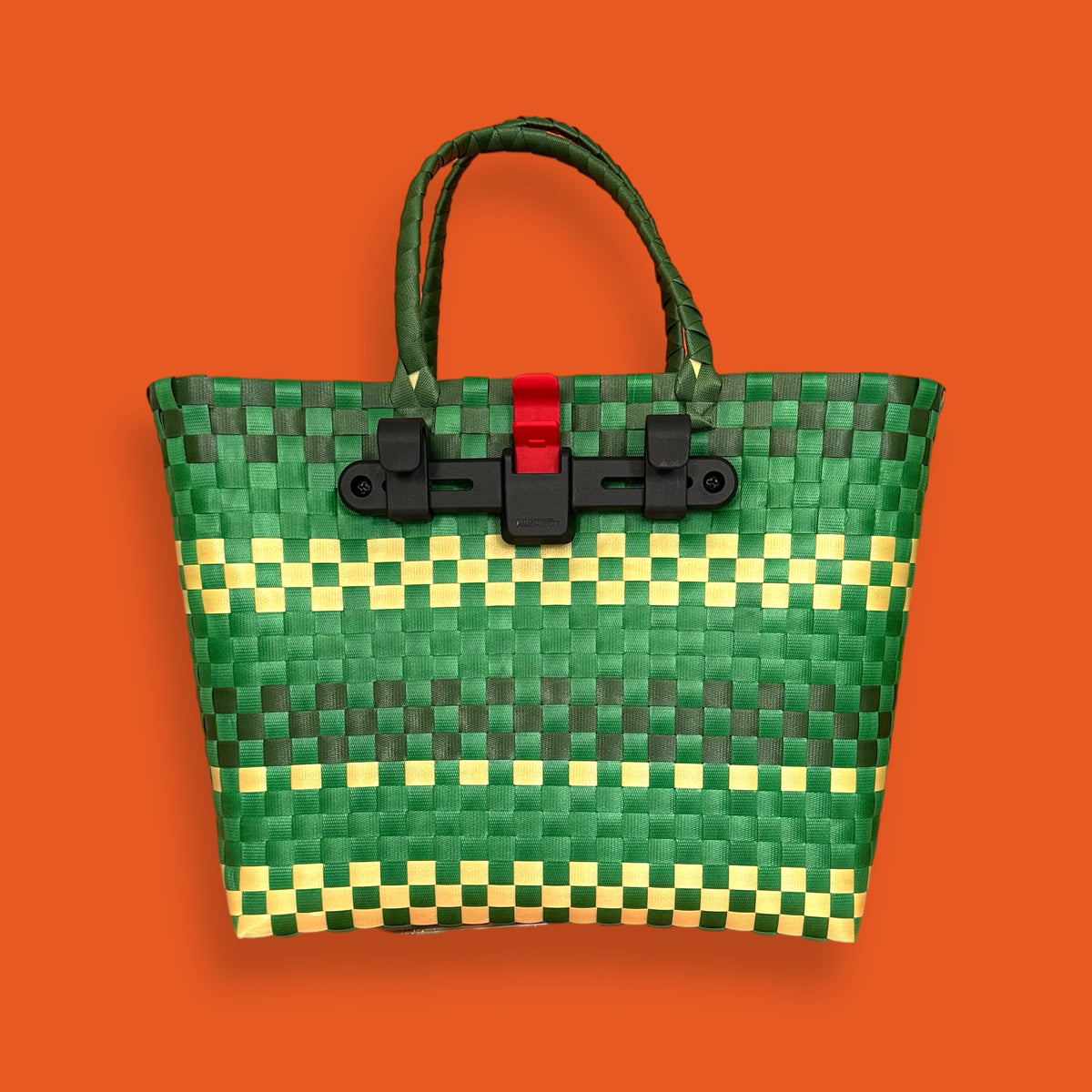 Green woven bicycle basket made from upcycled plastic