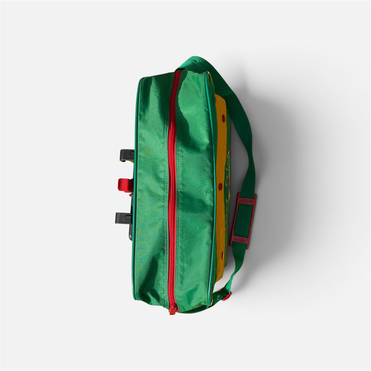 Retro green antler messenger bag pannier with red zip and embroidered pattern on front