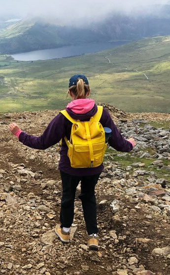 The rolltop backpack in yellow in Snowdonia with a very active customer!