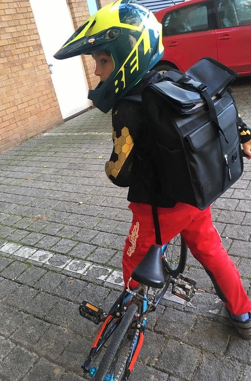 Ellis using his rolltop backpack for BMX