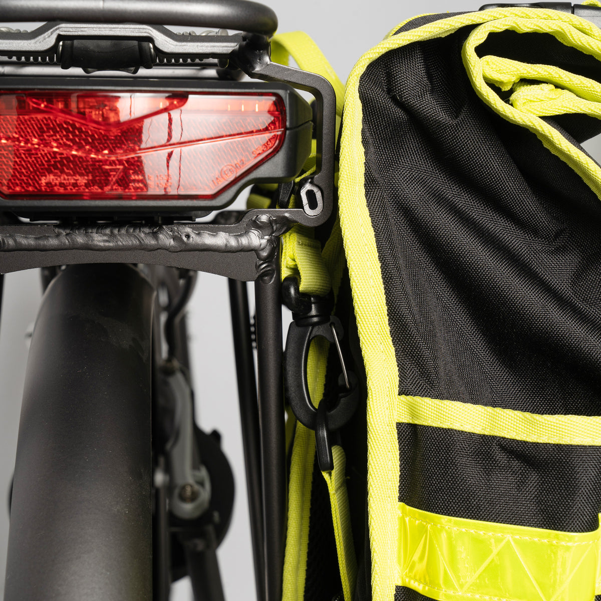Neon rolltop backpack black pannier bike bag - Goodordering Black and neon rolltop backpack for commuting and everyday travel