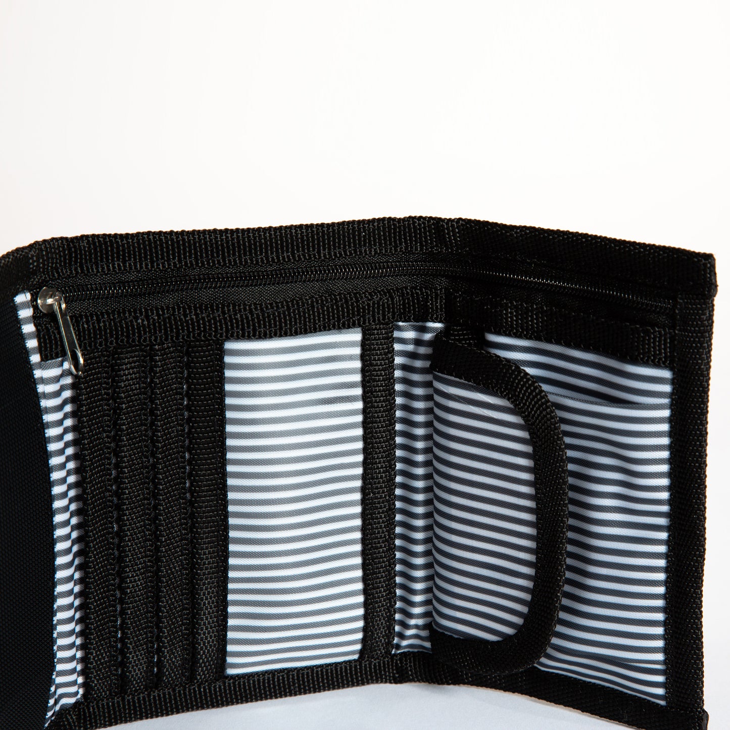 Inside of matt black velcro wallet with zip compartments Goodordering with coin compartment
