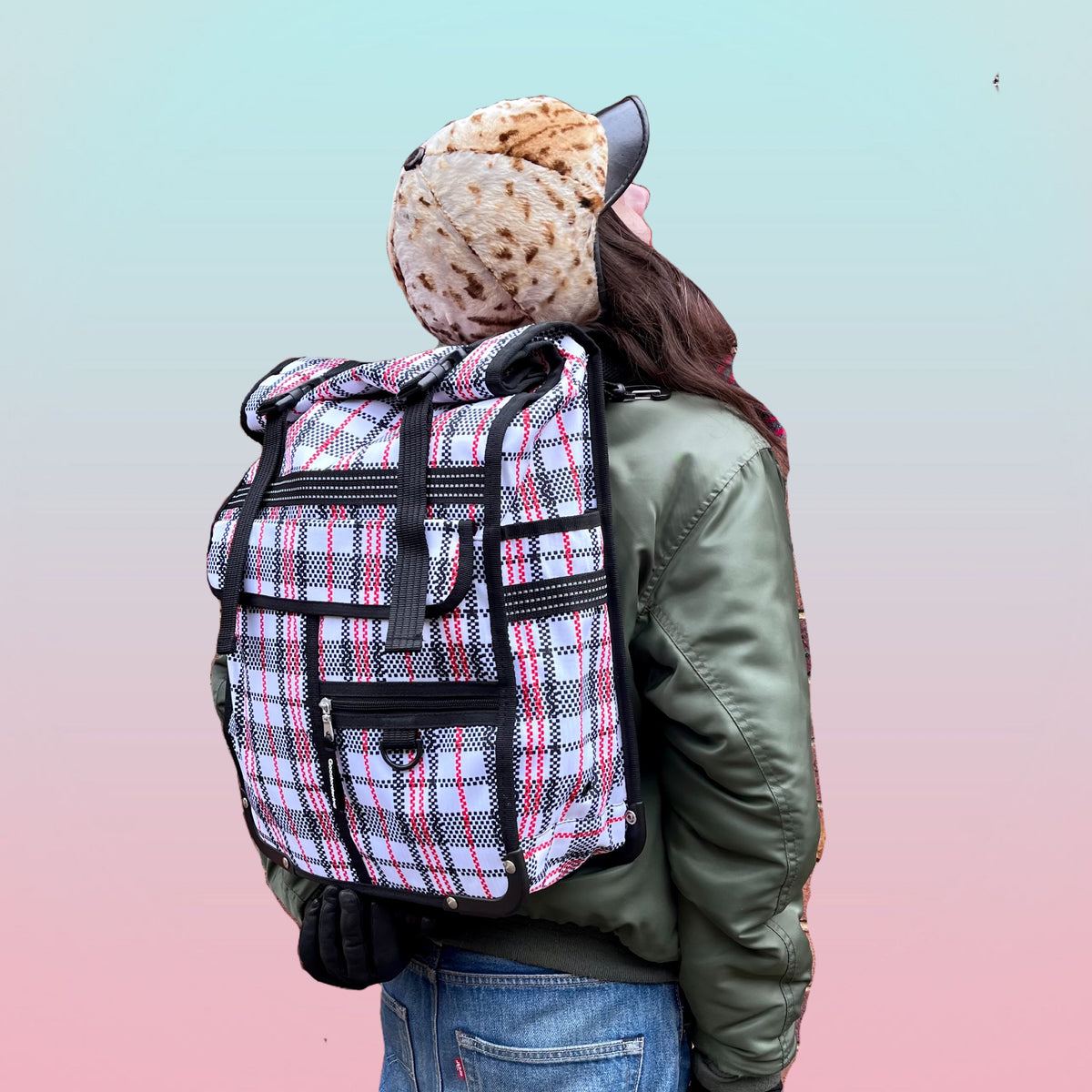 Tartan cycling backpack that attaches to a bicycle pannier rack